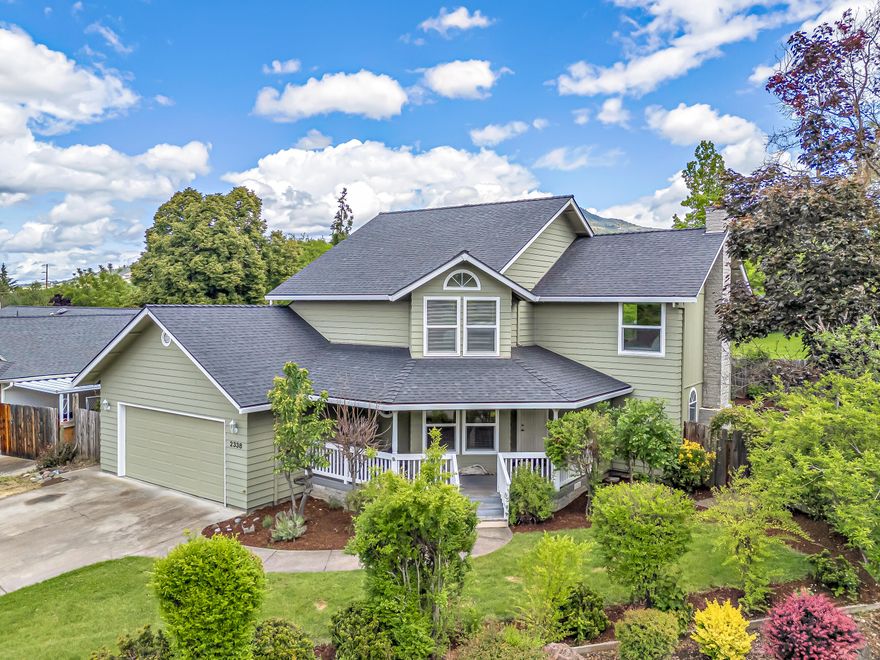 Charming 2-story home, nestled on a quiet cul-de-sac in E Medford! Step inside to find a cozy wood burning fireplace, fresh interior paint & inviting wood flooring in the main living areas. The dedicated office space has elegant French doors & a coffered ceiling w/ beautiful touches. The kitchen boasts an updated tile backsplash, modern lighting, gas stove & a newer dishwasher. Upstairs, the primary bedroom feels like a retreat, featuring tall ceilings, a spacious walk-in closet, views of Roxy Ann & an en-suite bathroom w/ skylights, double vanity & double shower. You will find 2 add'l bedrooms upstairs with built-in storage & a guest bathroom, which has also been refreshed with new flooring. Peace of mind comes with a well-maintained HVAC system, just 5 years old and serviced bi-annually, and a roof approximately 8 years old. The fully fenced backyard provides a private oasis for outdoor enjoyment. This home combines practical updates with desirable features, making it a must-see!