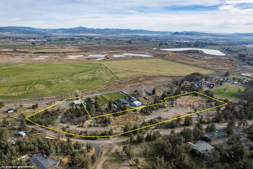 Here is your chance to purchase a great piece of buildable land, in a fantastic location, just a couple miles out the O'Neil Hwy. Over 4.5 acres with a lower portion that has
easy access to the hwy and even includes a machine shop full of character and history! Inside has large bay for working on equipment, workbench, and loft area for
storage, plus small office room. The upper part of parcel has been mostly cleared, and overlooks the valley, with multiple building sites w/ panoramic views. Community
water available and power already located on property. Don't miss your opportunity to see this!