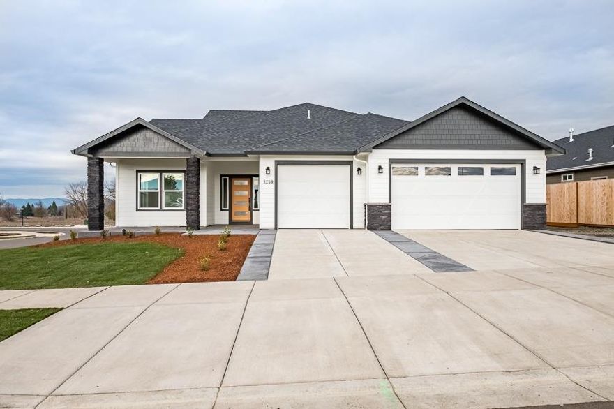 Exceptionally well built Chamberlin Home with many fine features. Upon entering, one encounters large open great room, island kitchen with granite, gas cook top, oven, microwave, and deep sink. Gas fireplace with custom wrap for extra warmth. Jack and Jill bedrooms, bathroom, plus 1/2 bath. Coffered ten foot ceilings, large master bedroom, quartz counters, double sinks, tile shower plus bathtub, and good sized walk-in closet. Huge 3 car garage plus large RV parking, boat, trailer or many items on east side of home.