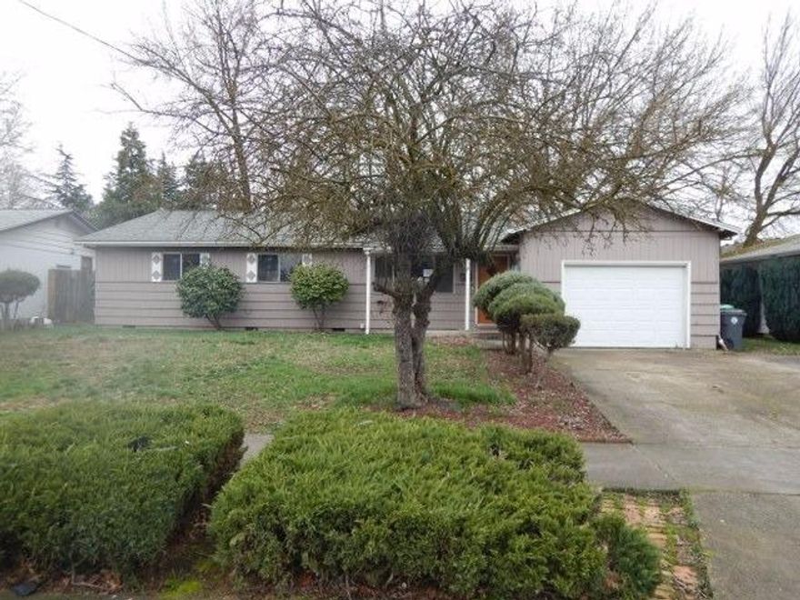 East Medford gem! Large lot with mature trees sorrounds a 3 bedroom, 1-1/2 bath home complete with built-in fireplace! New paint and carpet throughout. Indoor laundry room. Huge kitchen with lots of natural light. Covered patio
