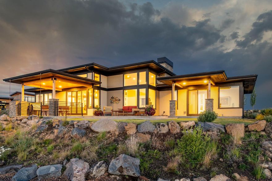 This contemporary home offers Cascade views, large windows, engineered hardwood floors, & soaring ceilings throughout. The great room features a gas FP and corner windows that frame the mtn views. A dining area connects the great room and kitchen, which offers quartz countertops & high-end appliances, including a 48-inch Miele gas range and two Miele ovens with steam options. Kitchen also includes an expansive pantry. On the opposite end of the home, pass the office on the way to the primary suite, featuring a patio and a spa-like bathroom with soaking tub & tile double shower. Upstairs, find a large open bonus area and flex room. Also on this level are two full guest suites w/ walk-in closets, large bathrooms, & ample sunlight. This home also includes a large laundry room off the mudroom & a 3-car garage with shop space and built-in storage. This home offers access to the trails, dining, and amenities that make the award-winning Tetherow Resort a wonderful place to call home.