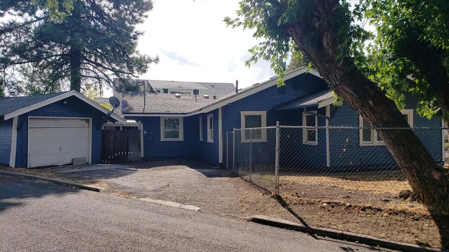 Nicely redone 3 bed 1 bath home with detached garage. Third bedroom has French doors and could be an office, den, dining room etc. This home has much of the original character with French doors for the 3rd bedroom. Built-ins kitchen cabinets have glass windows., new laminate flooring, new paint in and out.