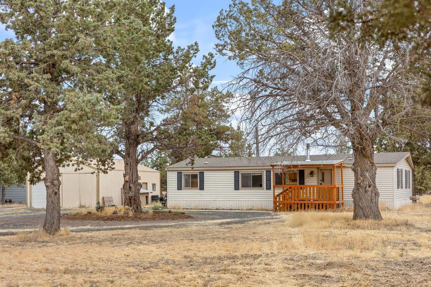 Desirable rare Central Oregon small acreage! This 3 bed, 2 bath manufactured home on 1.14 acres offers
a peaceful retreat just outside Terrebonne. Enjoy an expansive deck, fenced yard, and a large pole
barn with a shop. Updated Forced Air heat/ac, Granite countertops and beautiful Hickory cabinets as well as new paint and new flooring. Access Crooked River Ranch amenities like the clubhouse, pool, tennis courts and restaurant! Explore nearby Smith Rock State Park. Embrace Central Oregon living today with this lovely property.