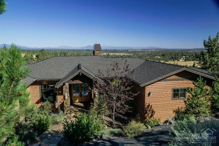 Dramatic custom Awbrey Butte mountain and Deschutes river view home. NW design & style with high quality finishes & features throughout including: exposed hand distressed Timbers & Beams, Knotty Alder Cabinetry, Viking & Sub-Zero appliances, 3 fireplaces, wet bar, wine cellar, media room w/ 72 projection screen & surround sound system. Spacious main level master with a spa-like master bath. Earth Advantage & Energy Star Certified home. Fully integrated audio system with touch screens.