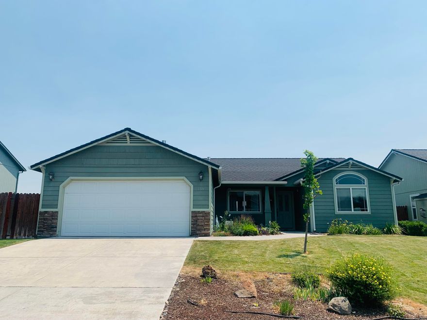 Come see this gorgeous home on a quiet street! This split floor plan house has been well maintained & is ready for someone to make it their own. Enjoy the covered patio with views of Stukel Mountain, open fields, and your own plum tree. With no neighbors behind the lot there is plenty of privacy, as well as access to the patio from the master bedroom. Very desirable neighborhood and only minutes from town.