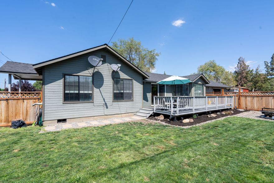 Take a  look at this beautiful one level home in S.W. Redmond. Unique open floor plan that boasts spacious kitchen ample size living room area and breakfast nook. updated flooring fixtures and lighting. Bathroom has been remodeled as well. huge .19  corner lot with R.V. parking, room for all your toys! Oversized garage. convenient location close to schools and shopping, great value!