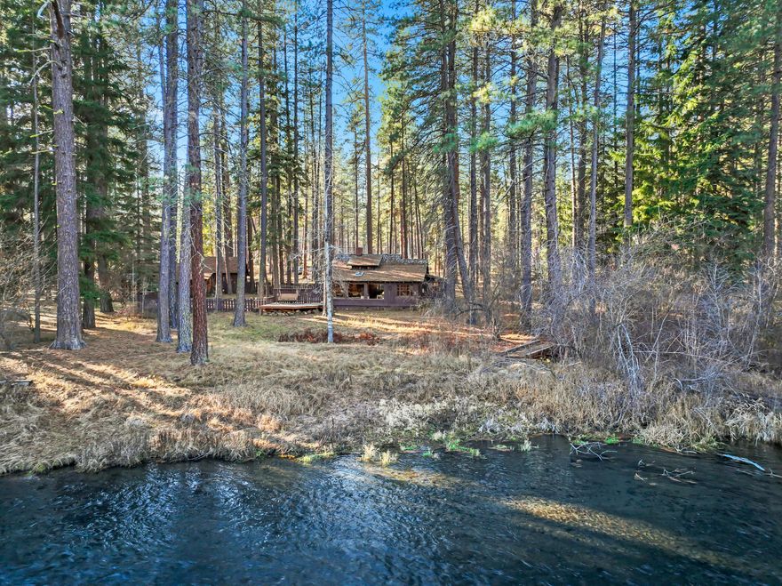Metolius Riverfront Cabin. A beautiful Tract O cabin site with Big River Views and a pastoral setting of grassy riverbanks and mixed conifer forest. Enjoy the rustic character of the single level 1053 sq ft cabin with 2 plus bedrooms, 1 bathroom and a large living area enhanced by a warming wood burning fireplace, knotty pine paneling and picture windows overlooking the river. There is a fenced yard, a large deck area for outdoor living and a detached garage/storage/woodshed building. The cabin is connected to a private water well, septic system and has existing propane and electrical service. The property is a US Forest Service Special Use Permit. There is extensive adjacent US National Forest, great trail access for hiking and year-round fly fishing that are all immediately available right out your front door. The nearby community of Camp Sherman offers a General Store/Deli, some wonderful restaurants and it is a short drive to the Old West Town of Sisters.