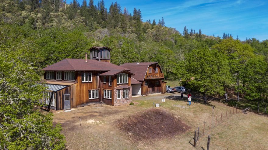 Horse property or WR zoning for Marijuana Cultivation. This 2782 square foot single family home has 3 bedrooms and 2.5 bathrooms.  13.4 Acres backs to BLM. 2 large Carports. Screened 2nd story deck. Laundry Shoot. A very large Workshop and a solarium.