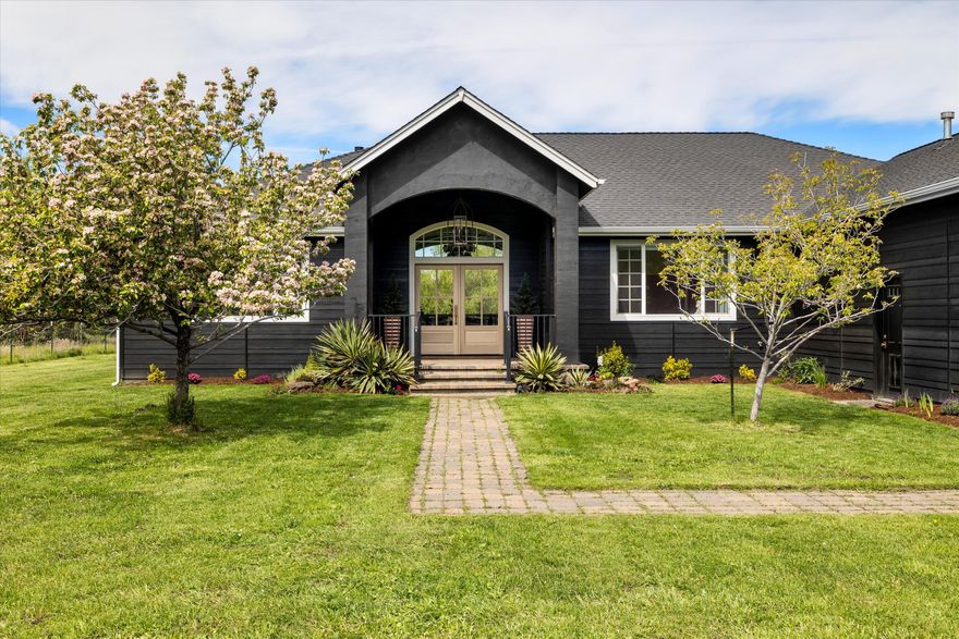 Beautifully renovated custom home on flat 4.6 acres,3 acres with COID irrigation.Single-level home offers 3 bedrooms, 2 baths + an office & vaulted ceilings in the great room and primary suite. Enjoy stunning Cascade Mtn and Pilot Butte views & Irrigation pond. The chef's kitchen features highend built-in appliances, a large island, and premium finishes. The luxurious primary suite includes a soaking tub, large shower, double vanity, and walk-in closet. Recent upgrades include new white oak cabinets, garage doors, a new front walkway, and large back porch plumbed for a BBQ, fire pit, hot tub, and sauna; perfect for outdoor living. The fully fenced property with auto gates includes fruit trees, a new greenhouse with raised beds and auto watering, chicken coop, playhouse, and garden shed. Ample parking with RV hookups, attached 2-car garage, and detached 2-car garage/shop. Zoned MUA10 with ADU potential, Avion water, and horse-friendly. Rare opportunity for usable acreage close to town.