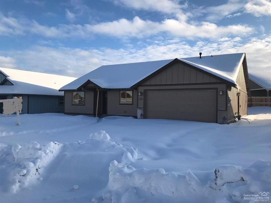 New construction in NW Redmonds Crane Meadow. 3 bedroom, 2 bath home in excess of 1600 sq ft of living area.Large Great Room with gas fireplace opens to Dining and Kitchen with eating bar. Knotty Alder cabinets with quartz slab counter tops, all stainless appliances. 30 year roof, forced air gas that is AC Ready. Separate utility room. Double car attached garage. Landscaped front with sprinklers. Single level home with great curb appeal.