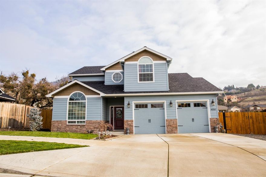 Be prepared for your friends and family to ask you to host all the parties! Soaring 20' ceilings greet you in the entryway and lead smoothly into the open living area. The kitchen, living, and dining area all flow together, creating the perfect area for all your entertaining. When the weather warms up, take the party outside onto the covered porch that overlooks the huge back yard, with a separate patio and seasonal creek. There's plenty of room to add a pool or hot tub if you really want to step up your game. The second level can become your oasis for relaxation when things wind down. The master bedroom boasts vaulted ceilings, a private balcony, and a spa-like soaking tub. No matter how many guests you're hosting, you never have to worry about running out of space: besides three bedrooms, there is a fully finished bonus room upstairs, as well as an office and a formal dining room on the main level, and giant RV parking right next to the fully finished storage shed with power!