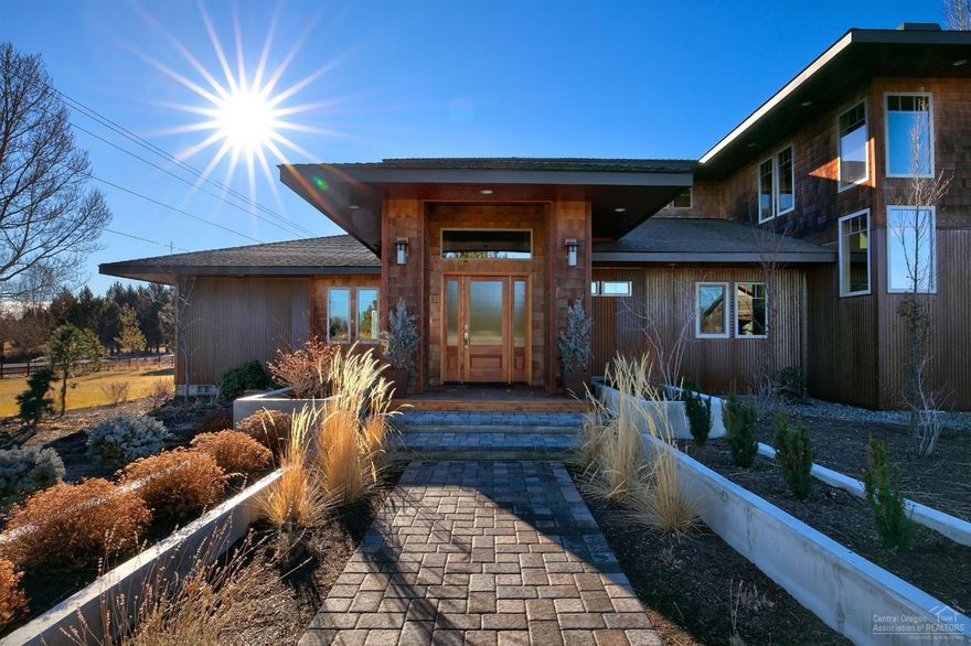 Gorgeous custom-built home with Cascade Mountain Views! Custom woodwork throughout featuring a master suite on the main level, gourmet kitchen with commercial appliances, theatre room, multiple living spaces & a huge private office! 10 manicured acres with 4 acres of irrigation, attached 2 car garage plus additional attached 3 bay shop with drive through.