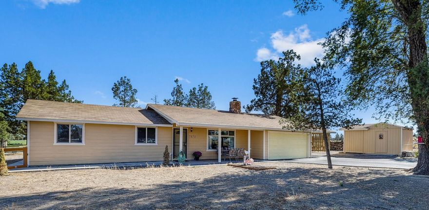 Don't miss your chance to own this rare small acreage property, conveniently located in SW Redmond. This charming, well-maintained home features a vaulted ceiling in the living room with exposed beams. You'll find numerous updates throughout, including a fully fenced yard, new kitchen cabinets, countertops, and appliances. The living room boasts a new electric fireplace, and new ceiling fans have been added in the kitchen, primary & living rooms. Enjoy new flooring in kitchen and living spaces and rest easy knowing a new well was just installed last year. This home has a large storage shed and covered carport in addition to the 2 car garage. With an acre of land there is plenty of space to park an RV & all your toys. Create your own backyard oasis, whether it's a garden, a small hobby farm, or simply a space to relax. Pride of ownership shines in this turnkey property. Buyer to do their own due diligence regarding all aspects of this property.