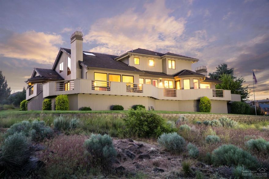 Classic & timeless, this custom built home atop .94 of an acre in the heart of Bend. The grand foyer opens to a spacious new kitchen, Oregon room and custom library with clear views of Mt. Bachelor. Relax & enjoy stunning city views from east to west in this modernized open-concept home. The master on main boasts a sitting area, double vanity, radiant heat & spacious boudoir. Upstairs includes 3 guest rms & spacious game room for play or in-house projects. Understated elegance in this Hillside Park beauty.