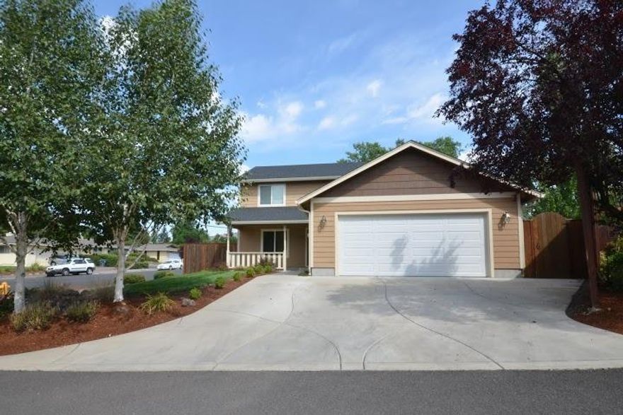 Located in one of East Medford's nicest established neighborhoods, and just like new built in 2008. This home has room for everyone, 1984 square feet and has 4 bedrooms and 2.5 bathrooms. Master has en suite bathroom and large walk in closet. 3 other good size bedrooms, linen closet and another full bath all upstairs. Formal living, spacious great room/kitchen area, laundry room and half bath down stairs. Kitchen has a large island, built in appliances, and tons of storage. Indoor laundry room with additional storage and finished 2 car garage. Beautifully landscaped front and back yards with in ground timed sprinklers, covered front porch and mature trees. Nice size back yard has a patio and tall 8ft fence for privacy. Large gated RV parking. This home is a Must See!