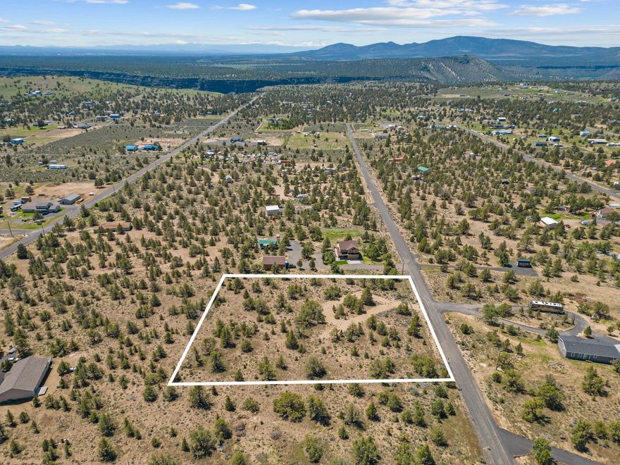 Beautiful property with Cascade Mountain views just a short drive to Prineville in the PLA2 subdivision. Property is fenced and gated and has power available at the corner.
Multiple building sites. Paved roads all the way up until the last few hundred feet (community paves more roads each year) Prineville Lake Acres has water available to all
lot owners for $100 per year or drill your own private well. Area is known for good wells. Located just a few minutes to Prineville Reservoir where you can enjoy boating,
fishing, and swimming. Access to over 75,000+ acres of public BLM land is right down the street. Approximately 15 minutes away you will find the quaint town of Prineville
with a new state of the art hospital, breweries, incredible restaurants, and within 30-45 minutes of the Ochoco National Forest where you can enjoy mountain biking, hiking,
wild horses, and stunning scenery.