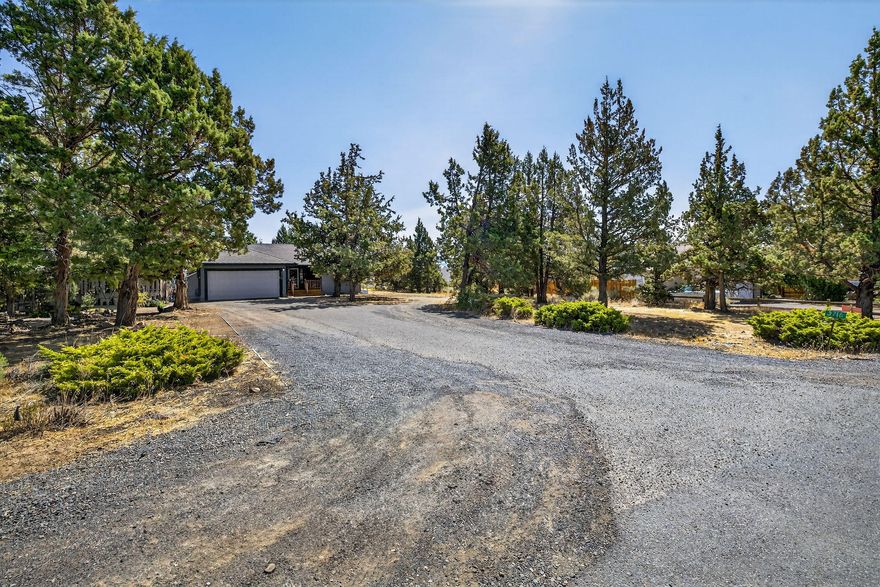 Dont miss this updated home on a 0.69 acre lot in the popular South Heights subdivision in Redmond. 2 storage sheds 10 x 20 and 8 x 10 included . Want chickens? Those can be included as well.  Great floor plan, main on one side and 2 bedrooms and a bath on the other. Updated kitchen and both bathrooms, flooring and carpet. Roof was replaced in 2018. Plenty of parking for all your toys, RV's, Boats, Trailers, and NO Hoa's! Wont last!