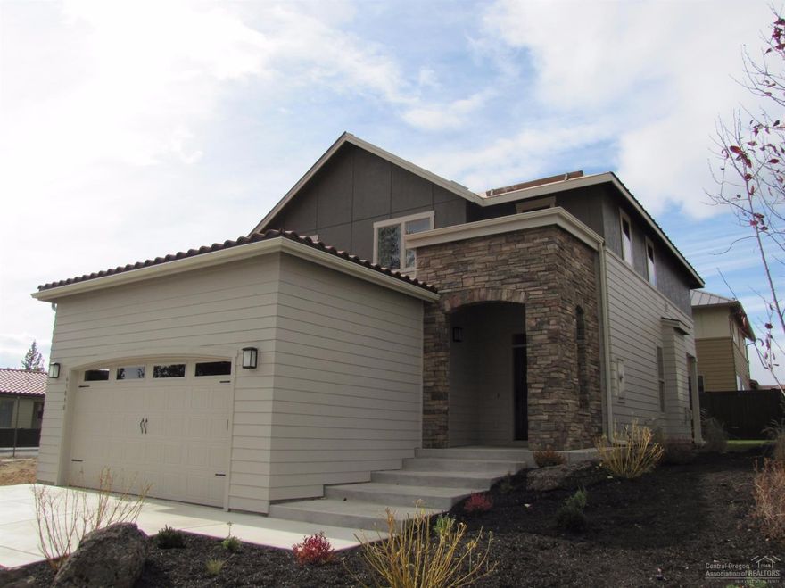 Woodhill Homes' new NW Bend neighborhood, single family homes. This gorgeous new home has a large kitchen/dining area and a spacious great room with a fireplace on the main level. 3-bedrooms, loft area & utility at the top of the stairway. Kitchen features solid surface counters w/tile backsplash and stainless steel appliances. Full baths have tile counters/backsplashes and undermount sinks. Master has dual vanity, tile shower & walk-in closet. Neighborhood amenities include option to join clubhouse/pool.