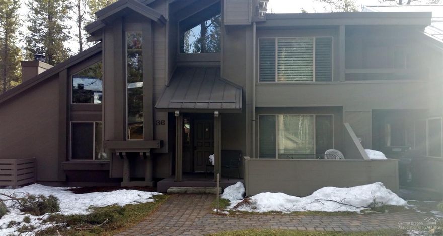 Newly remodeled Kitchen, Bathrooms, Carpet, windows, paint and so much more. This Townhome has a nice open floor plan and is a perfect vacation rental with a good rental history. Walk to the Village, Resort and SHARC. SHARC is paid in full. Natural gas is available. This Townhome comes fully furnished including the beautiful patio set. Situated on the backside of the complex you can relax in privacy. This is a must see! Don't forget to ask about the amazing loft and 2 extra little lofts!