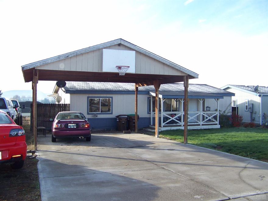 Affordable home in a nice neighborhood. Open floor plan, vaulted ceiling, 2 bathrooms. Home has tie downs which helps with financing. All new interior paint. Good starter home or rental with lots of opportunities to improve the property.