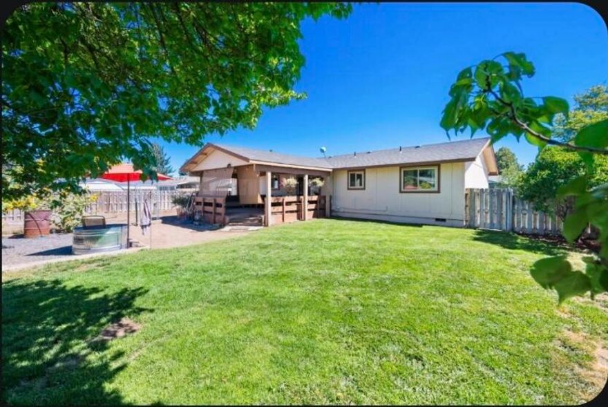 3 bedroom, 1 bath home with fantastic features inside and out! This charming home has had some beautiful updates. Including Stainless Steel appliances, updated countertops, cabinets, fresh paint and gorgeous Pergo floors throughout. The property offers many outdoor conveniences including RV parking, alley access, a beautiful back yard with fruit trees, well manicured grass and a flower garden. There is also a fenced dog yard that could easily be used for storage, more yard, or a beautiful garden space. The possibilities are endless! Relax on the huge covered deck, perfect for entertaining or simply unwinding. Located within walking distance of schools and the fairgrounds. Also close to town for easy amenities and convenience. Don't miss the opportunity to make this wonderful property your new home!