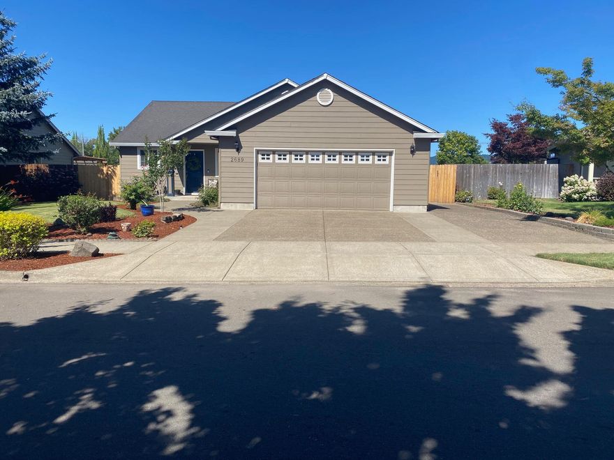 This recently updated home has 4 bedrooms and 2 full baths, front and back covered patios, hard flooring in all but two bedrooms, and has a RV/Boat Pad.  Single story with attached, two car garage, vaulted ceilings, french doors that open up to beautiful views from the back patio with a manicured, fully fenced backyard.  There are no homes behind you!