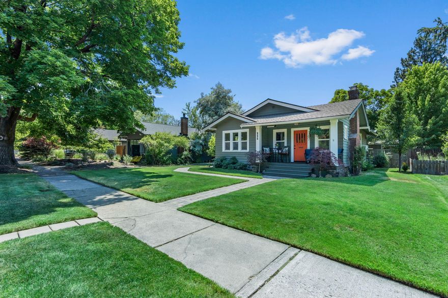 Nestled in the idyllic historical district of Bend, this charming 1920s bungalow is the perfect retreat. This property is perfectly located smack dab between the old mill and downtown Bend!  Meticulously maintained, this home boasts an open great room floorplan with an updated kitchen and bathroom with heated floors. Light and bright the kitchen boasts leathered quartz countertops, and custom cabinetry throughout all while retaining its historical charm. Below you will find an additional 242sf laundry and game room basement.  The backyard shines with its extensive paver patio, gas fire pit, and glorious garden beds perfect for entertaining BBQs this summer.  The detached heated 280sf garage/shop with wiring for 50AMP is perfect for additional storage, hobbies, car storage as well as providing additional privacy. Your oasis awaits!