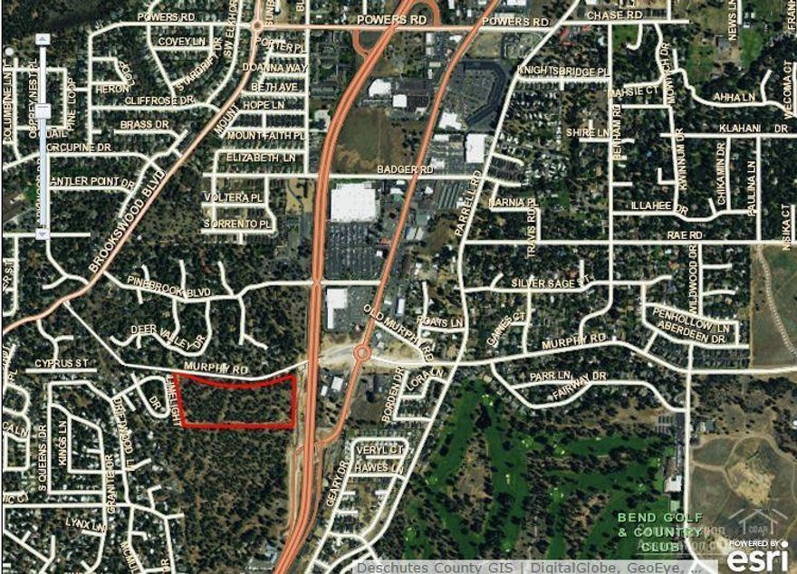 This development parcel is located on South Highway 97 and fronts the Murphy Road extension to Brookswood Blvd. Ideally located to serve the fastest growing neighborhoods in Bend, the site has excellent access to the Parkway via the Murphy Road roundabout, overpass, and ramp. Residential development in southwest and southeast Bend has outstripped commercial services. The split commercial, mixed-use, and multi-family zoning is extremely flexible and would allow a combination of retail, medical, office, hotel,&nbsp;<span style=font-size: 10pt;>restaurant, and multi-family residential. Near Wal-Mart, Nike, Bend Factory&nbsp;</span><span style=font-size: 10pt;>Outlet Stores, Pioneer Crossing, and the new St. Charles Medical Clinic. T</span>he site could be combined with 2 adjacent parcels to the south: the WinCo Parcel (16.37 acres) and the<br>Oregon Department of Transportation Parcel (17.41 acres) allowing the developer the ability to create a master planned community on over 48 acres of