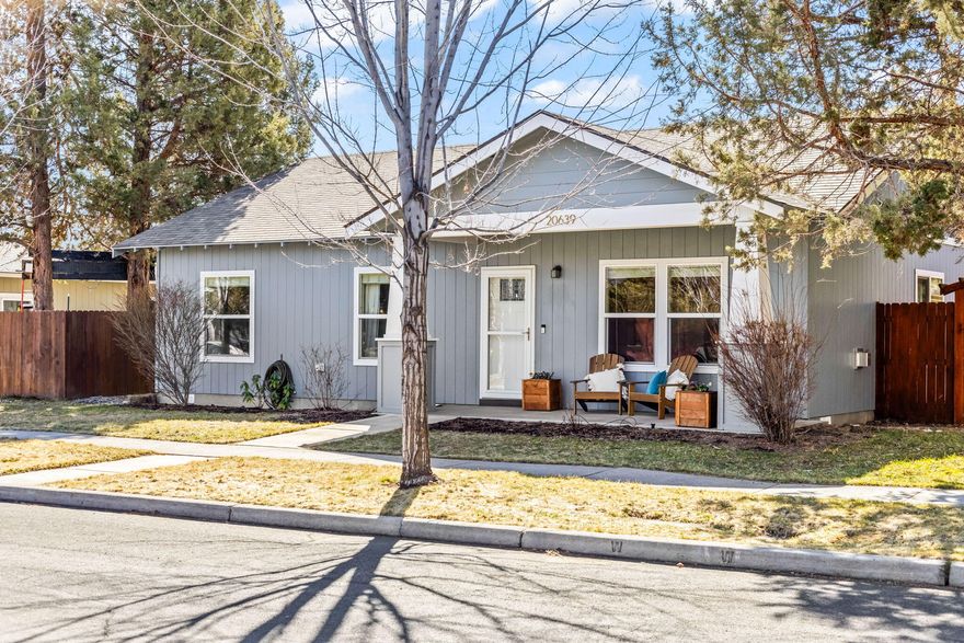 Welcome to your warm and inviting single-level retreat in Southeast Bend! This meticulously maintained 3-bedroom, 2-bathroom home boasts an open concept living space with vaulted ceilings, flooding the interior with natural light. Enjoy southern exposure in the backyard, perfect for maximizing daylight throughout the day. Inside, laminate hardwood floors, a cozy gas fireplace, and a tile shower add to the charm and comfort of this home. Step outside to your backyard oasis, complete with a paver patio, a built-in pizza oven, a firepit, and ample space for entertaining, gardening, and relaxation. Situated in Bend's up-and-coming southeast side, this home is within walking distance to the new Alpenglow Park and Caldera High School, with exciting additions on the horizon. Don't miss the opportunity to make this delightful home yours! Schedule a showing today and embrace the best of Southeast Bend living.