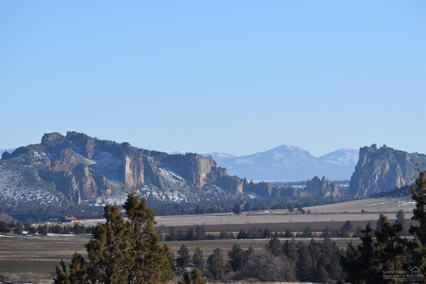 Stunning Smith Rock views and beautifully updated home on desirable secluded irr. acreage just minutes to Terr/Redmond, Home features fully renovated kitchen w/granite counters, custom Knotty Alder cabinets, ss appliances, Mstr suite w/extensive custom tile work in remodeled bth, new laminate flooring, wrap around deck, nice shop, hot tub, 52 ac. parcel with 7 irr. ac. & new irr. pump & all appliances included. Looking for huge views, privacy, lovely home, and large parcel close to town, look no further.