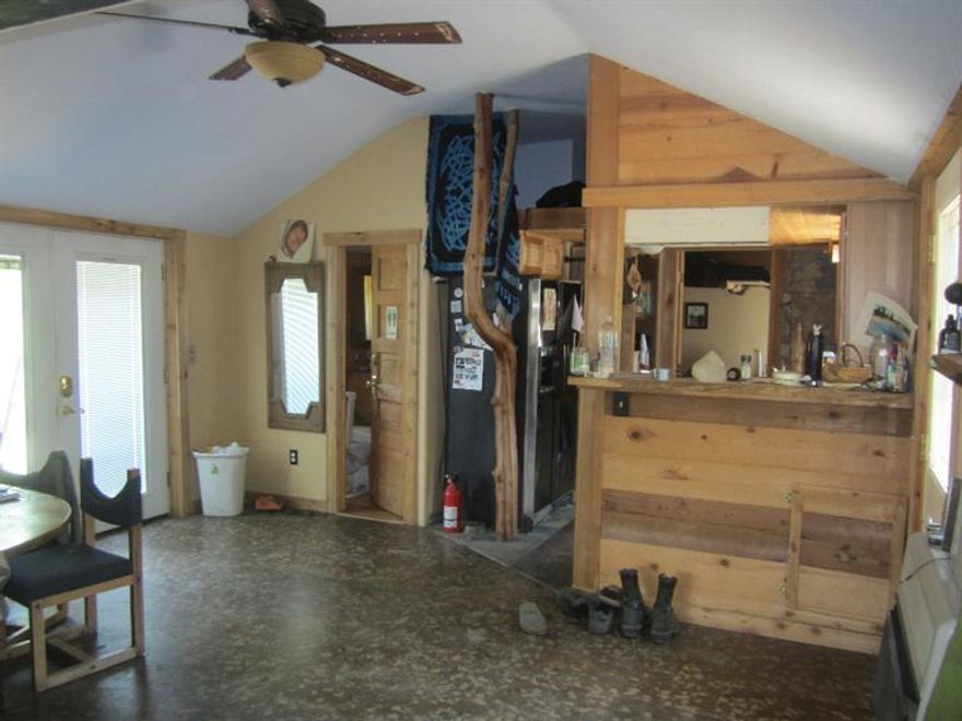 Here you go! This is a Great little cottage located close to downtown Ashland with many upgrades inside and out. A newer comp roof tops of this country charmer. Raised bed gardens for your veggies and several fruit trees allows you to grow much of your own food. The interior of the home features a gas range on demand hot water and many custom touches including a claw foot tub.