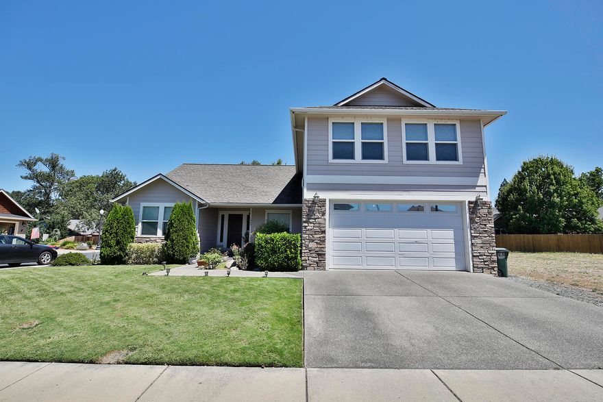 Large beautiful home in River Pointe Estates with deeded access to the majestic Rogue River. Spread out in this 2,587 Sqft. 3 bd/3 Full ba., Living room and Elegant Dining room with so many amenities including, Vaulted ceilings, Lg. Master Bedroom/Bath, Den, Granite counter tops, Breakfast nook, Gas fireplace, Hard wood floors, Jetted tub, walk in closet, Lg. Laundry room, Lots of storage, Upstairs family room with Wonderful views from every window, Deck and low maintenance living. Across the street is a path to the river and community area for you to enjoy. Seller is providing a 1 year Fidelity home warranty as well!!