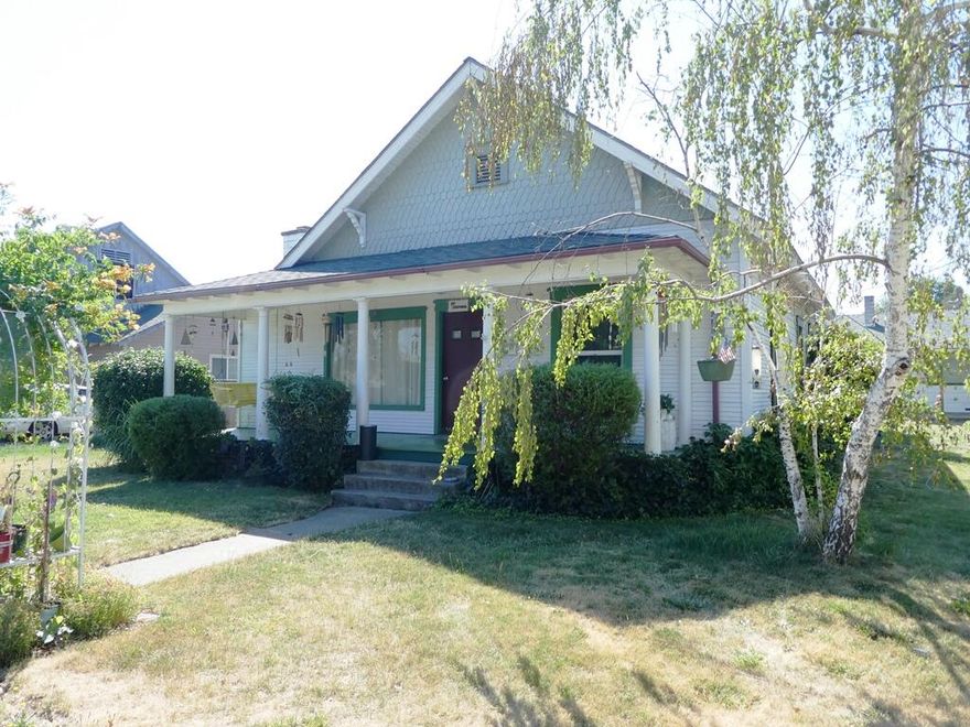Great investment opportunity priced to sell! This fixer includes two homes on an oversized city lot with R-3 zoning. Main home, built in 1910, 2-bedrooms & 1-bath w/galley kitchen & detached back cottage built in 1958 w/1-bedroom & 1-bath. Newer roofs on both homes, all thermo windows with the exception of mainly the large picture windows, new main water lines & newer kerosene heater in back cottage. This property offers close proximity to all city services and features alley access. Current rents are $1,030 & $600 monthly and include water, sewer & garbage. Buyer to do own due diligence and must accept long term tenants at closing. Property is being sold in AS/IS condition! Please DO NOT disturb the tenants and serious buyers only!