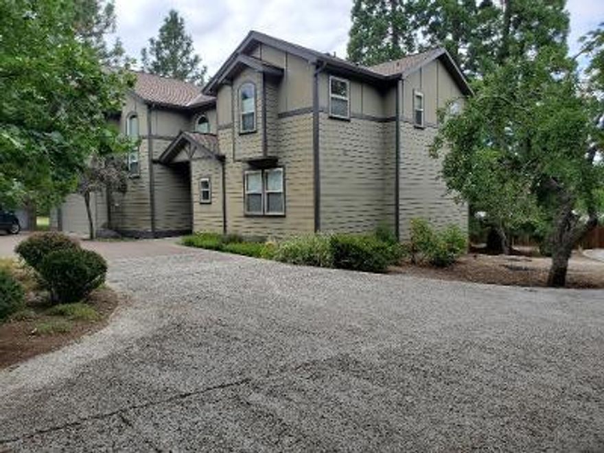 WOW! Unbelievable well maintained, light and bright gorgeous home with everything from gated entry, 4 bedrooms, 3 baths, huge family room, den/study, formal dining, open kitchen with island, granite counter tops, wood floors, bedroom on main level, decks, views, .27 acre nearly level lot and the list goes on (please see attached amenities) for this Star & Earth Advantage home in great location. Master bedroom is large with huge spa like bath featuring soaking tub and separate walk in shower, private toilet area and walk in closet. Enjoy the views from the private balcony. Two additional large bedrooms and full bath. The family room is enormous with room for all things fun. 9' and vaulted ceilings, dual control heating and AC. Wood floors are solid Red Oak. 2 decks, raised garden beds, paver driveway and mature landscaping with massive Redwood Tree. This is just simply a fantastic home offering every quality detail a buyer is looking for.