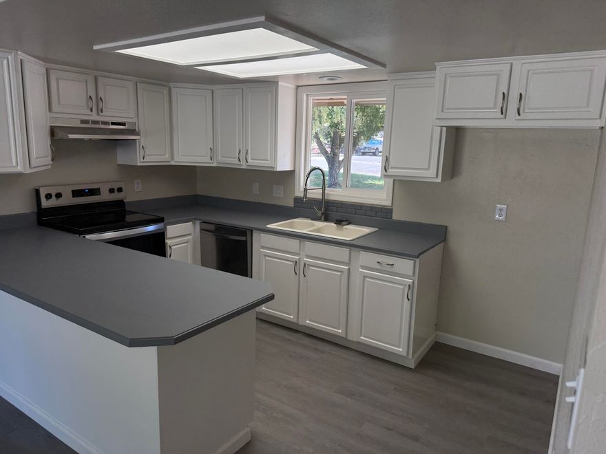 Move-in ready! From the moment you enter, Brand new carpet, Vinyl Plank floors. New paint inside.  New Roof.  Home has both Living Room and Family Room. Living Room is separate allowing for quiet activities. Family room is adjacent to the kitchen and dining area making it a perfect entertainment center. Huge laundry room with storage. Master with walk-in closet. Nice master bath and hall bath both with tile floors and counters and tub/showers. The large backyard is private, has a nice patio and lots of space for activities.  RV parking.