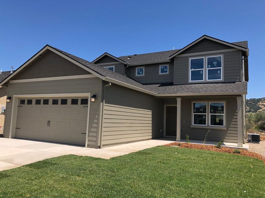 Move in Ready!! The 2026 square foot Stoneridge is popular with those needing more space in an efficiently planned two-story home. The first floor is open throughout the family and dining room and into the kitchen where there is a large island and plenty of cupboard storage. The formal dining room can be converted into an optional den or fourth bedroom with full bath. Upstairs, the expansive master suite features an oversized closet plus a deluxe ensuite bath, including a soaking tub and dual vanity. This floor is also home to two more large bedrooms, a full bathroom and the conveniently located laundry room. . . Pictures are similar. Move in Ready