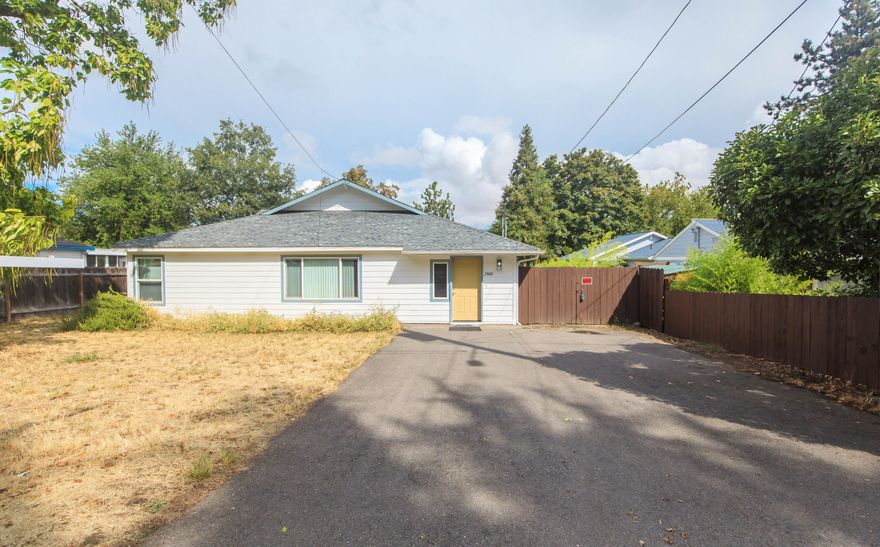 Charming Ashland home in a fantastic neighborhood! The home boasts 2000 SQFT 4 bedroom, 2 bathroom home recently painted inside and out. This move-in-ready property features vaulted ceilings, brand-new heat pumps for year-round comfort and new carpet. Enjoy stunning mountain views from the large back deck. With two gas meters, two electrical panels, and two heat pumps there's excellent potential for duplex conversion—ideal for investors or multi-generational living.  Buyer to do their own Due Diligence regarding Duplex conversion.