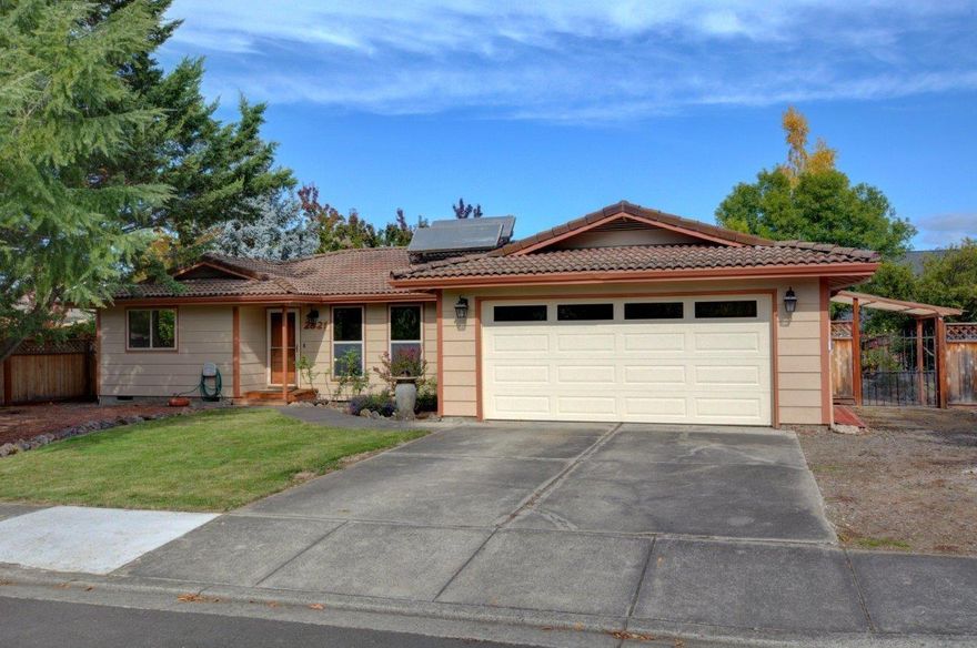 Beautiful home in East Medford is ready for you. This 3 bed, 2 bath, 1785 sq ft, open floor plan home sits on a spacious .24 acre lot has a lot to offer. Large formal living room & a large family room, wood floors throughout house, solar/electric hot water heater with additional gas water heater. Spacious kitchen with a free-standing island, custom cabinets, kick open drawers, abundant storage, & instant hot water. Master bedroom has custom built walk-in closet, attached updated master bath, with access to a private covered deck that offers hot tub hookups. Enjoy the large backyard that offers two decks & a patio for all your entertaining needs, great garden area with a greenhouse attached to a finished shop that is over 550 sq ft.(per county) where the possibilities are endless. Timed sprinkler system, Large attached two car garage offers ample storage. RV parking on side of house. Cement Tile roof & new exterior paint. Buyers to do their due diligence on all aspects of property.