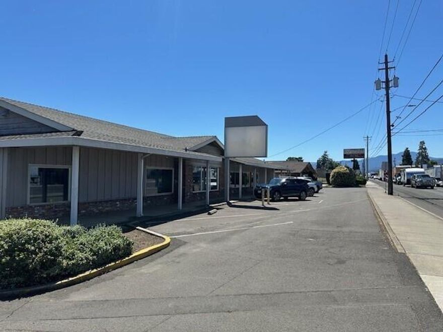 Excellent Retail/Office location with High ceiling storage in Downtown Medford.	Former Spectrum Retail store with excellent signage. Front office/showroom remodeled in 2017.	Space includes large 
retail/office area, two ADA washrooms, multiple private offices, break room and outside fenced storage area with is covered and secure. Rear section is 5,000 square feet of high ceiling radiant heat
warehouse & 2 story office with HVAC.	Two 14-foot high roll-up doors with grade-level loading. Many uses possible.	No hemp/cannabis storage, manufacturing or processing.