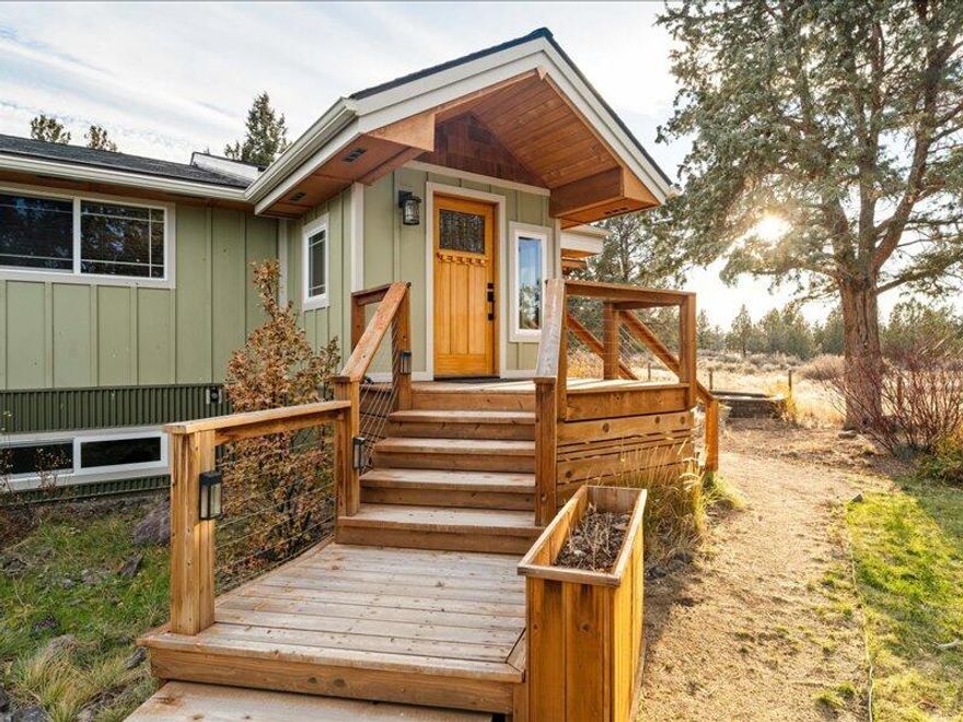 Fantastic Central Oregon location w/ mountain views. Resting just west of the small but mighty town of Tumalo. Only minutes to downtown Bend, Tumalo State Park and the Deschutes River. Horse trails, hiking, biking and everything else Central Oregon has to offer are all nearby. If you want to create a homesteading lifestyle, this is it! Greenhouse, fenced in garden area Chicken coop, dog kennel, horse shelter, wood shelter and more. While the vegetables are growing you can star gaze while soaking in your peaceful hot tub. The home offers beautiful vaulted wood ceilings, bamboo flooring, tile bathrooms, wood and pellet stoves, newer furnace & roof. Septic tank replaced in 2011. Community well maintained by Avion Water. Great room upstairs and bonus family room below with office/exercise area. Big utility/ mud room w/ washer & dryer. Huge 2 car garage w/ shop area and RV Parking. Come see!