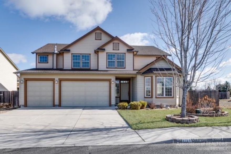 Beautiful 5 bedroom 2.5 bath with office/6th bedroom and open concept living.The kitchen is a chef's dream with granite counter space galore, ample cupboard storage, SS appliance, large walk in pantry making it a perfect area for gatherings and entertaining. Stunning hardwood floors throughout the main floor. Master suite offers soaking tub, dual vanity, and large walk-in closet. Huge Laundry room on 2nd floor.Attached 3 car garage and a fantastic fenced yard.