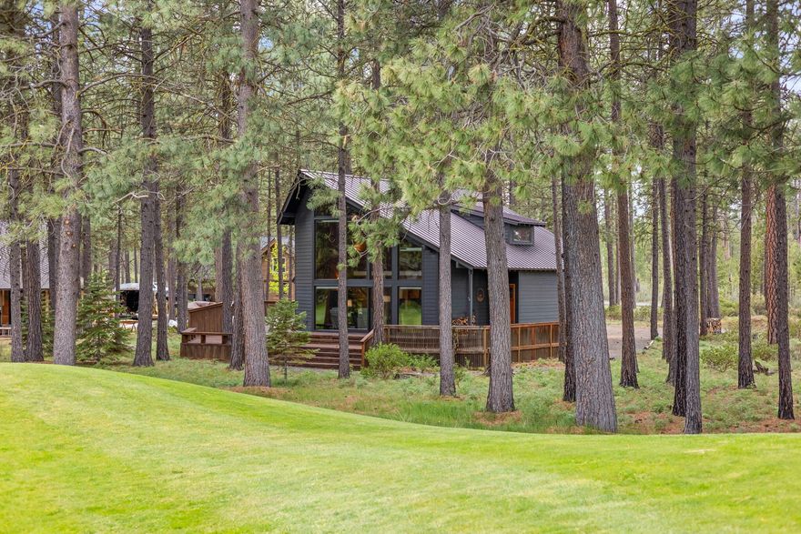 Situated on a prime lot fronting the 6th green of Big Meadow golf course on a very low traffic street. This home offers a blend of classic elements and modern updates. Interior features: four bedrooms; open floor plan; high vaulted ceilings; exposed beams and wood paneling; solid Alder doors; new wood frame windows; natural light from great room window wall; new flooring in bathrooms; stacked stone fireplace with a new wood stove. Spacious loft provides additional living space. Kitchen is equipped with leathered granite countertops, Alder cabinets, stainless steel appliances, slate tile flooring. Outside, a large deck overlooks the golf course, complemented by cement siding, fresh exterior paint, a metal roof, new furnace and hot water heater. Black Butte Ranch amenities include two golf courses, miles of walking and bike paths, multiple pools, restaurants, and recreation centers. The home's location also offers convenient access to an alternative resort entry and exit for added ease.