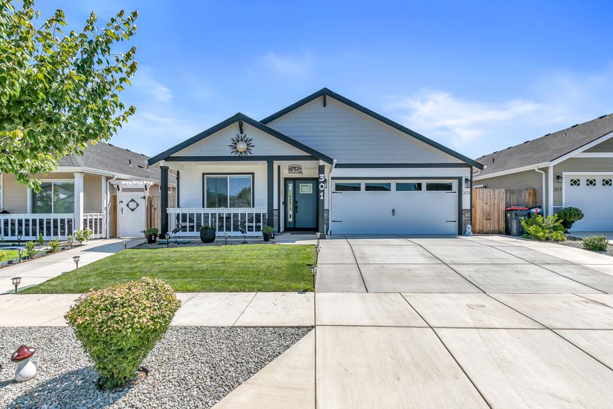 Welcome to 301 Reanna Way in Medford! Built in 2021, this beautiful home features high-end finishes and has been meticulously cared for. Offering 3 bedrooms, 2 bathrooms, and a thoughtfully designed floor plan, this property provides both style and comfort. Enjoy quality craftsmanship throughout—including upgraded fixtures, modern cabinetry, and elegant surfaces. Vaulted ceilings and large windows create a bright, open feel, while the backyard offers the perfect space for relaxing.
