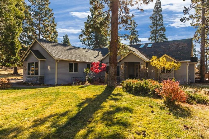 Introducing this single level gem at the top of the ridge at the Running Y. You will love this open, great room floorplan with 3 bedrooms and two and one half baths, plus an office. The kitchen opens to the dining area, boasting granite counters, tile floors, alder cabinets and newer appliances. The vaulted ceiling great room is warm and cozy with the wood floors, gas fireplace and sky lights in the foyer. A large new composite deck runs the length of the home. The spacious master suite has double mirrored closets, private bath with double vanities, Jacuzzi soaking tub and separate shower. The nearly half-acre home site has towering pines and cedars plus a level driveway with extra parking. A special feature is the doggie courtyard'', which doubles as a grassy side yard and private garden spot for raised beds. Notice the entry water feature along with the splashes of fall color. Pride of ownership shines - ask agent for list of amenities, upgrades and additions.