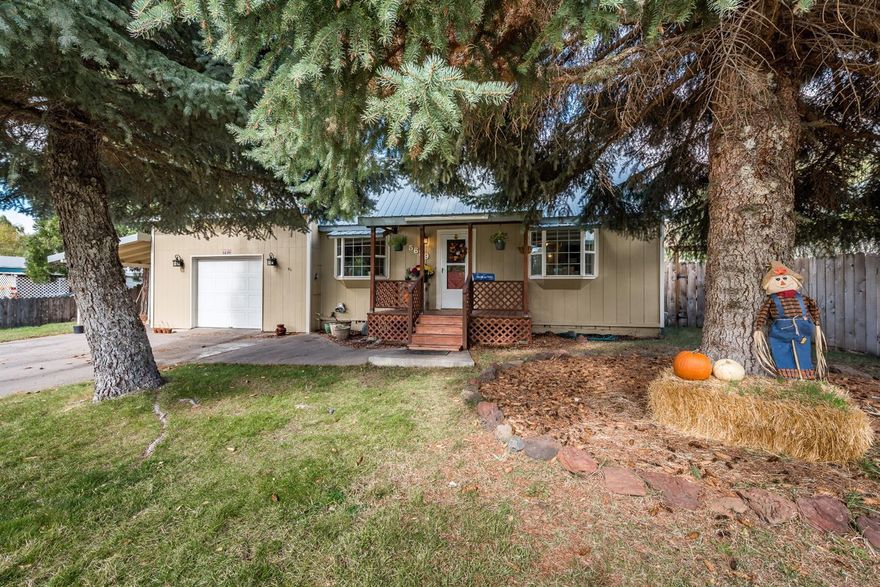 Beautiful home, centrally located in the South Suburbs and very nicely updated. Carpet has been recently replaced, newer duct work, insulation, flooring, siding, trim. This home boosts a metal roof and updated bathrooms and front porch. Acreage close to town for all types of extra toys and room for the kids to play. Established back yard with chicken coop, dog kennel and sand box. Irrigated and underground sprinklers available. Ample storage available with extra outdoor buildings (garden and storage shed). Raised garden structure included. Sale contingent upon sellers finding suitable housing.