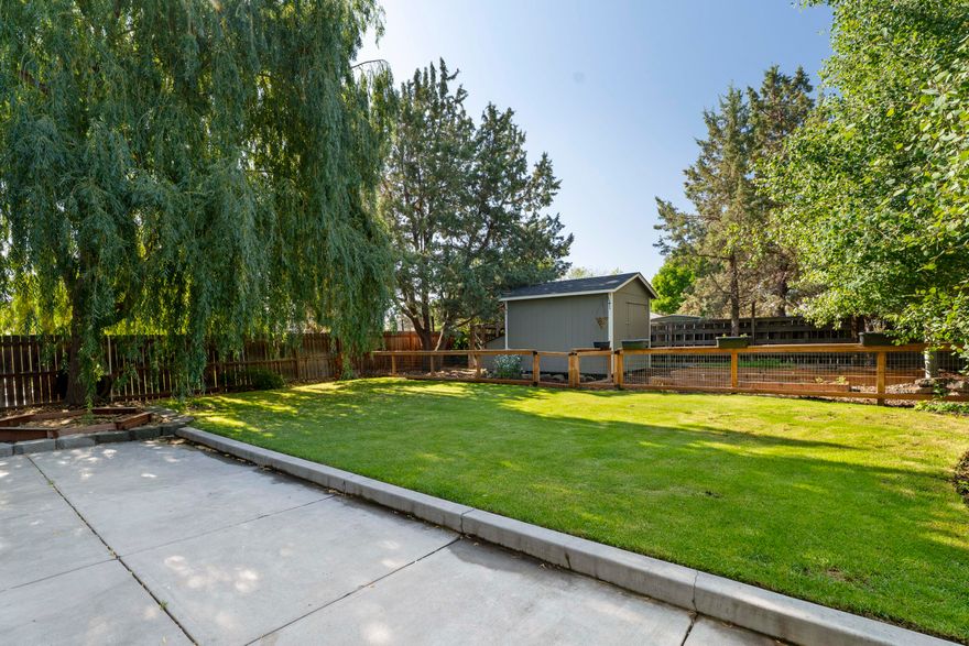 Back on the market at no Fault to home/Sellers!
Located on a tree-lined street in desirable SW Redmond, this well-maintained 3-bedroom home includes a spacious upstairs bonus room that can serve as a 4th bedroom. The main level offers flexible living with two distinct living areas—ideal for a home office, schoolroom, or second family space. The updated kitchen features Bosch appliances and enjoys excellent natural light throughout the day. The fully fenced backyard is a private retreat with mature trees, a gated garden, large storage shed, chicken coop, and paved patio area with new awning. Additional amenities include a lean-to for storage on the east side of the home, designated RV/trailer parking, and a tandem 2-car garage. No two-story homes behind the property ensure enhanced privacy and open sky views. A thoughtful layout inside and well-planned outdoor space make this property a versatile and inviting place to call home.
New Redmond Rec Center- Walking Distance
Qualifies US