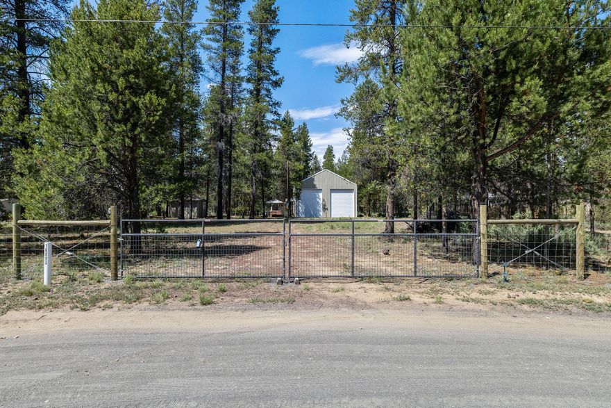 Buildable Lot with well installed in 2020, which is currently set up as a family recreational property. Suitable to build your vacation home or permanent residence OR just use as your own private retreat! Property is mostly fenced and gated. Permitted Pole Barn (30X40), with two additional outbuildings for storage. Perfect for an RV Compound with FOUR 30 amp RV stations with frost free water spigots.  Campout while you build the real thing!  By car, you are within 30 minutes of Newbery National Monument, Pauline & East Lakes and just 10 minutes from La Pine State Park with Deschutes River access. Come make this your home away from home for Kayaking, fishing, snowmobiling, hiking, X-country skiing and more! Legal Lot of Record Application in process with Deschutes County.