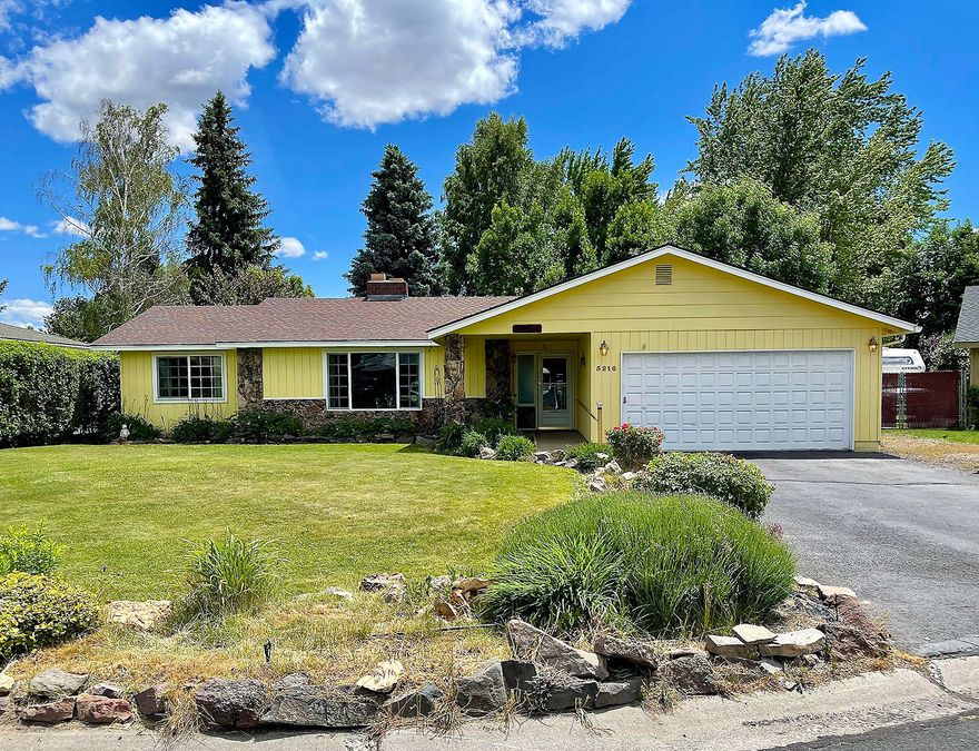 Peaceful by day, tranquil by night, this well-maintained Gatewood home sits in a private cul de sac. Offering 2023 sq.ft. of living space, this spacious home provides 3 large sized bedrooms and 2 full bathrooms with accessibility features. Front entrance has an accessible approach with ramp which can be removed. Beautiful stone slate entrance welcomes you into a large living room providing a feeling of coziness with a built-in wood burning fireplace. Separate dining area, kitchen with pantry and breakfast bar, family room with a built-in gas fireplace, linen closet, laundry room, very large master bedroom with walk in closet, and much more. Property is fully landscaped and fenced with a sprinkler system in the front and back, square raised garden beds on a drip system irrigation with matured pear and plum trees. Enjoy your morning coffee on your covered backyard deck or evening fun in your jetted tub. New A/C and heat ducting. Roof replaced in 2009. A Must See!!!