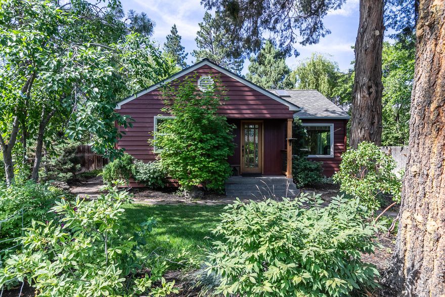 This charming Westside Bend home you've been waiting for is now available.  Located a block from the Newport Market as well as all your favorite restaurants nearby.  Plenty of updates including skylights, solid granite kitchen counter tops, soft close hardwood cabinetry, newer appliances, Italian porcelain tile flooring and bamboo vanity in the  custom master bathroom with walk-in tiled shower and radiant floor heat make this home ready to be enjoyed today.  The beautifully landscaped and fenced yard along with the covered pergola, walk around stone pavers and raised garden beds are ready for your outdoor enjoyment and entertainment.  The newer storage shed is ready to secure all your outdoor sports equipment for enjoying all that Central Oregon has to offer or possibly convert into an artists den or personal workspace.