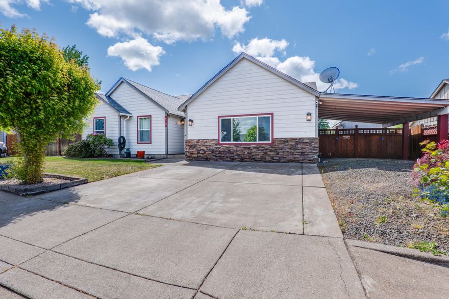 Welcome to this beautifully maintained 1,801 sq ft single-story home featuring 4 spacious bedrooms and 2 full bathrooms. From the moment you step inside, you'll be impressed by the soaring high ceilings and extensive upscale finishes throughout. The chef's kitchen is a true centerpiece, boasting a large marble island, marble countertops, sleek stainless steel appliances, and custom European cabinetry offering both elegance and efficiency. Both bathrooms are tastefully designed with custom tile work, while recessed lighting and dimmers throughout the home allow you to set the perfect mood in every room. These thoughtful details enhance the open, airy layout and provide flexible lighting for any occasion. Step outside into a private backyard retreat, complete with a covered patio, durable Trex deck, elegant gazebo, and a relaxing hot tub/spa ideal for both entertaining and everyday enjoyment. So much more come look today!